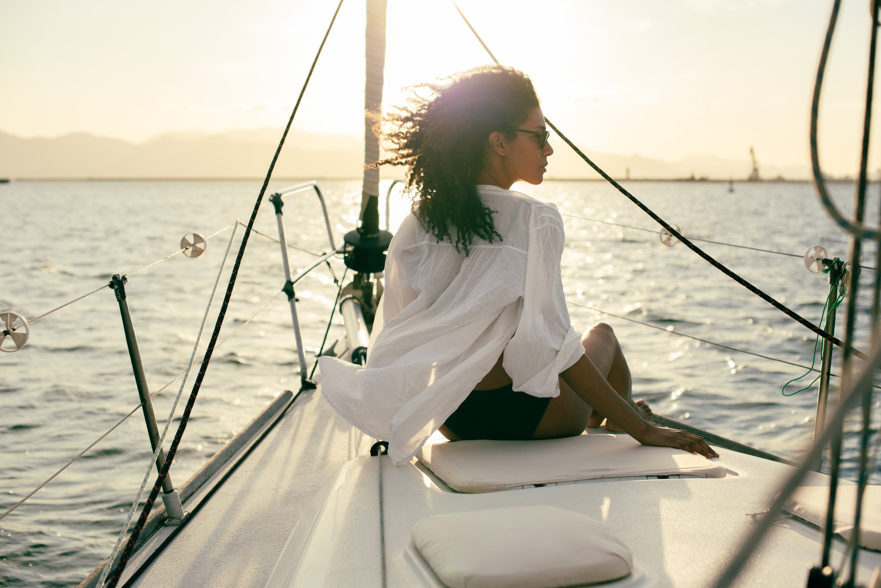 Woman Sitting on a Boat